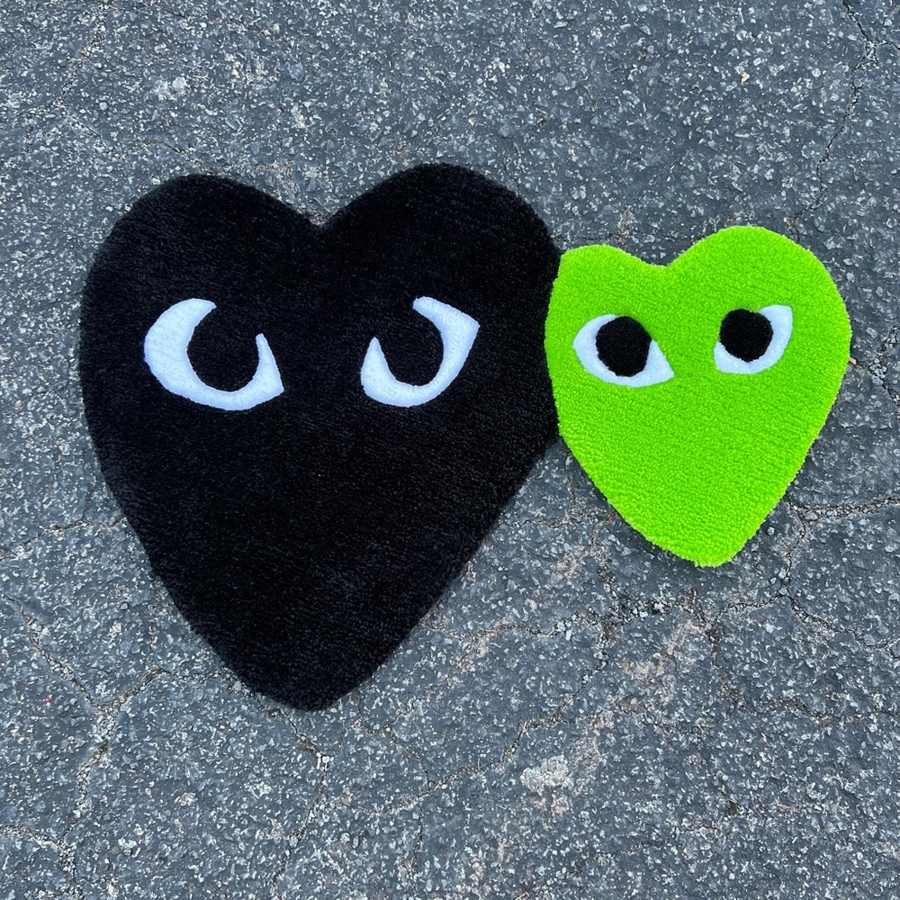 Heart-Shaped Black and Green Rugs